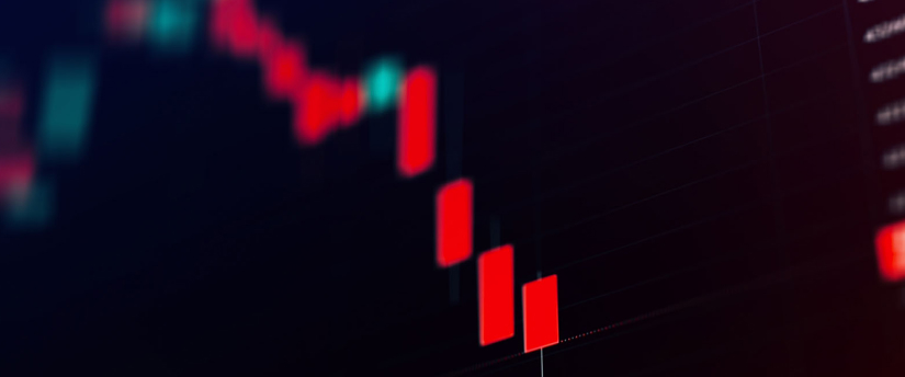 Stock market chart displaying red and blue bars, illustrating fluctuations in market performance over time.