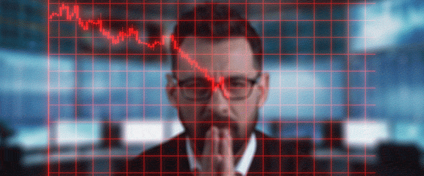 A man in a suit examines a graph, analyzing data trends and insights in a professional setting.