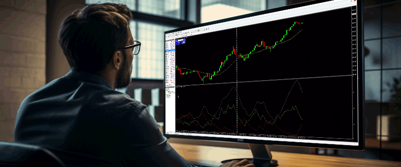 A man at a desk analyzes a stock chart on his computer, focused on trading strategies using MT4 software.