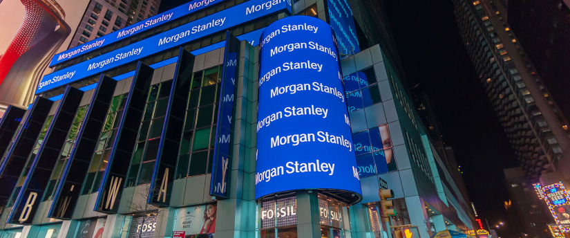 A large blue sign prominently displayed on the side of a building, capturing attention with its vibrant color.
