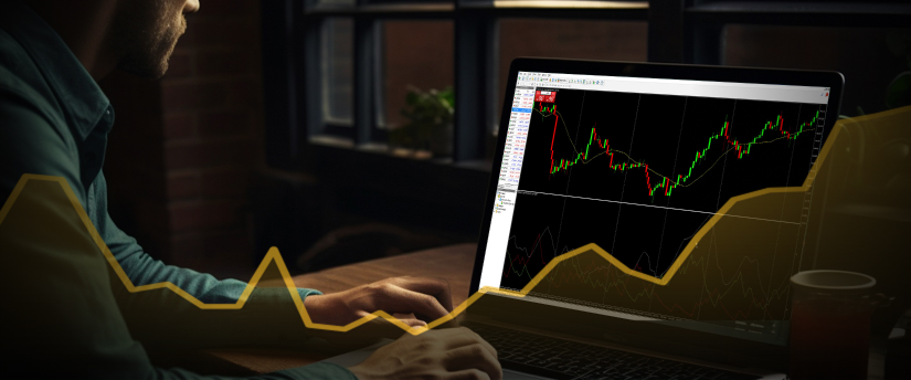 A laptop displaying forex trading platforms, with a trader analyzing market movements and executing trades efficiently.