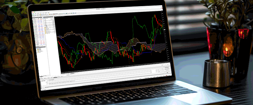 A laptop displaying a chart on its screen, illustrating trading data from the MetaTrader 4 platform for Forex.
