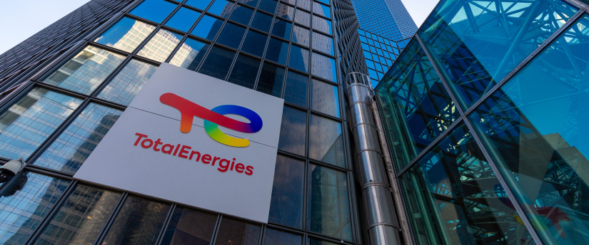 New logo of Total Energies, displayed prominently at their gas and oil headquarters, symbolizing innovation and sustainability.