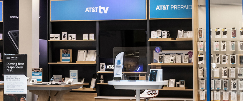 A retail space displaying numerous electronic devices, such as computers, smartphones, and accessories, inviting customer exploration.
