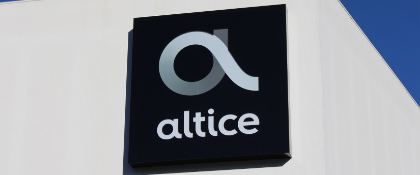 Altice logo displayed on a building, related to stocks and finance