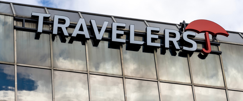 A sign for travelers displayed prominently on the side of a building, guiding visitors to their destinations.