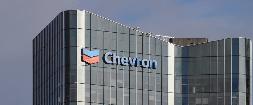A substantial structure featuring a distinctive chevron logo, highlighting its significance in the urban landscape.