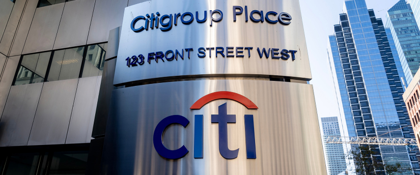 Citigroup stocks and profit growth with a store building in the background, symbolizing financial success and investment.