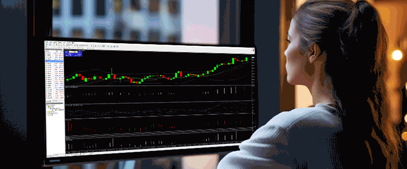 A woman studies a trading chart on a screen, focused on understanding market fluctuations and investment opportunities.