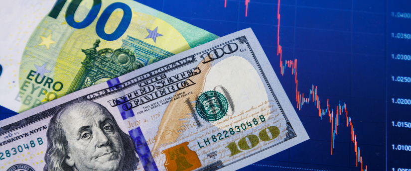 Euro and dollar currency trading displayed on a stock market screen with fluctuating graphs and numbers.