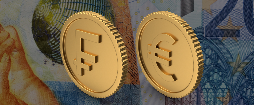 A gold euro coin placed atop a banknote, symbolizing European currency and finance.