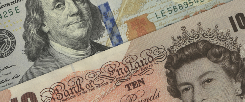 The British pound is trading at 1.3100 against the US dollar on a financial market display.