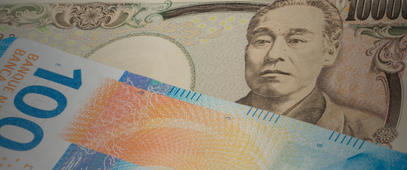 A Japanese banknote featuring a detailed portrait of the emperor, showcasing traditional design elements and colors
