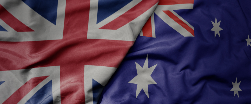 Australian and British flags displayed side by side, symbolizing the connection between the two nations.