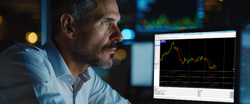 A focused trader studying technical charts and indicators to understand the basics of metals trading.